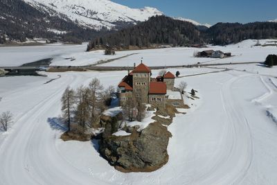 Scenic view of snow covered mountains