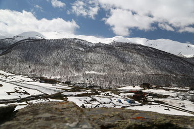 Snow covered mountain against sky