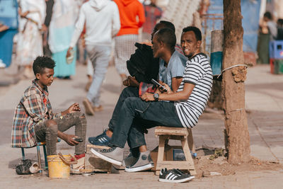 People sitting outdoors