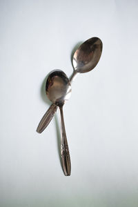 High angle view of electric lamp against white background