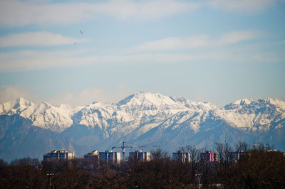 Scenic view of mountains against sky during winter