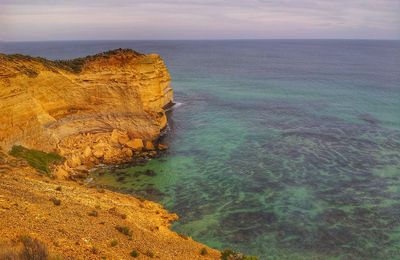 Scenic view of calm sea against sky