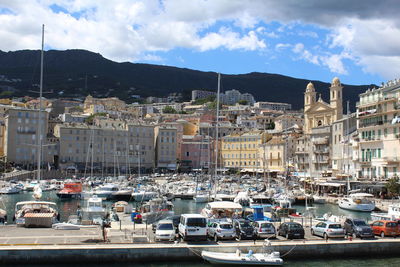 0high angle view of boats moored at harbor in bastia