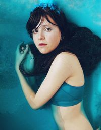 High angle view of young woman in bathtub