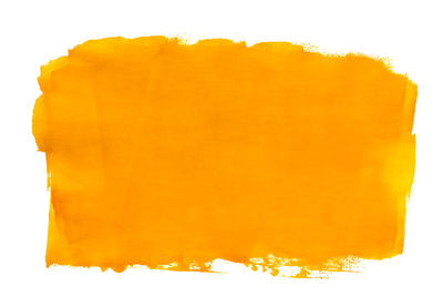 Yellow painted paper against white background