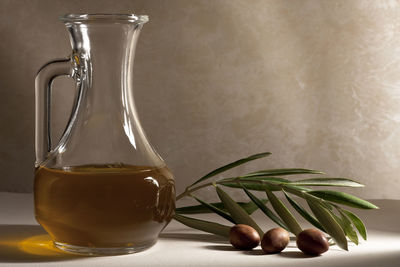 Close-up of drink in glass jar on table