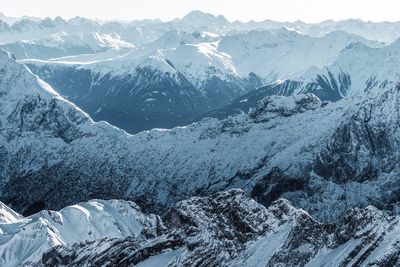 Scenic view of snowcapped mountains during winter