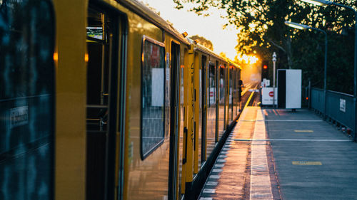 Train at railroad station platform in city