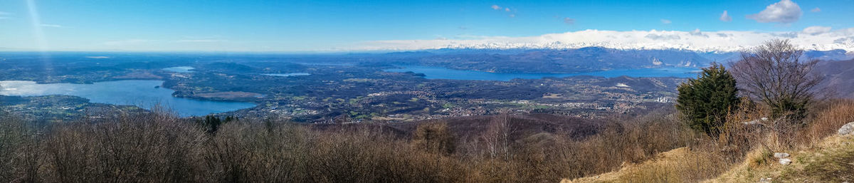 Wide angle view of the lake maggiore and the alps from mount campo dei fiori.