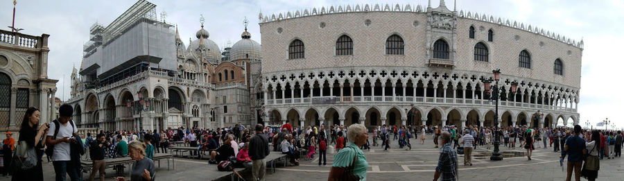 Tourists in front of historic building