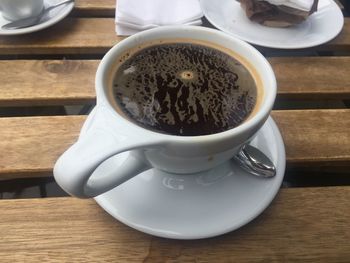 High angle view of coffee cup on table