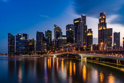 Illuminated city at waterfront