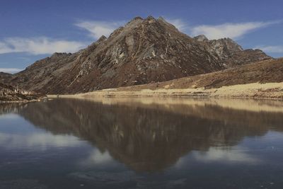 Sela lake, reflection of the mountains on the water, tawang district of arunachal pradesh, india