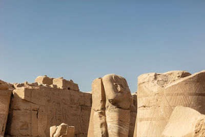 Different hieroglyphs on the walls and columns in the karnak temple.