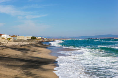 Scenic view of beach against sky