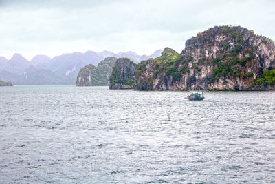 Scenic view of bay against sky