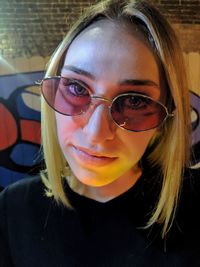 Portrait of young woman wearing sunglasses