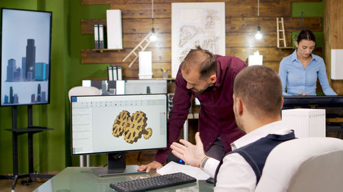 Businesswoman working at desk in office