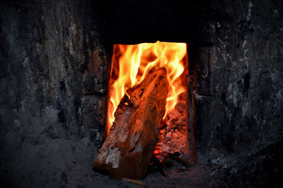 Close-up of fire burning in wood