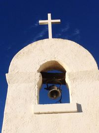 Low angle view of built structure against blue sky