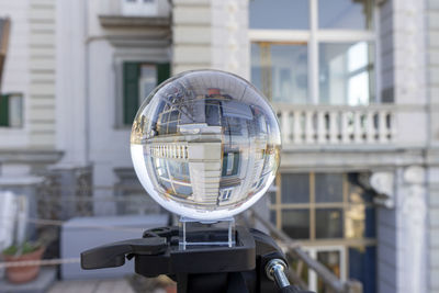 Close-up of bubbles against building in city