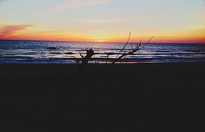 Scenic view of sea at sunset