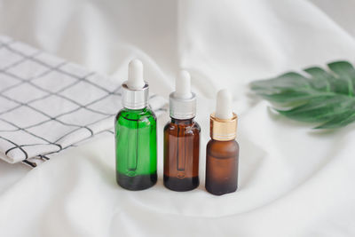 High angle view of bottles on table