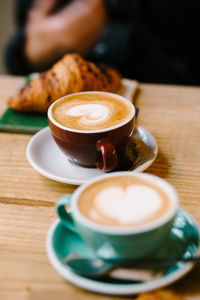 Close-up of cappuccino on table