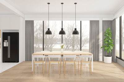 Minimalist dining room with wood floor. 3d rendering