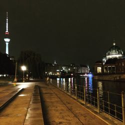 Illuminated city buildings at night