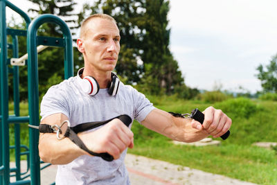 Mid adult man exercising outdoors