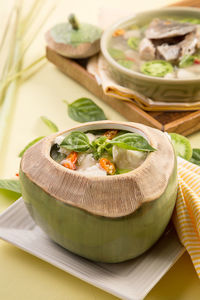 Fish soup served in coconut shell