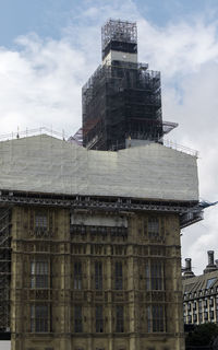 Low angle view of old building against sky