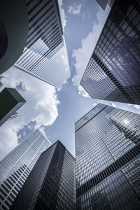 Low angle view of modern buildings against sky