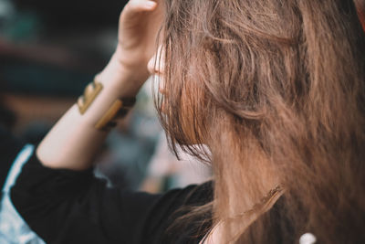 Close-up of woman with brown hair