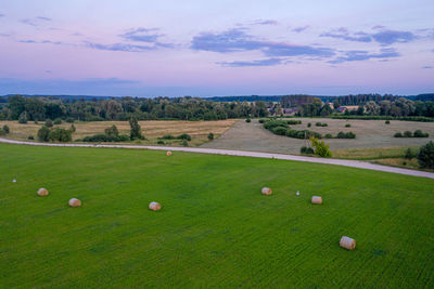 High angle view of golf ball on field against sky