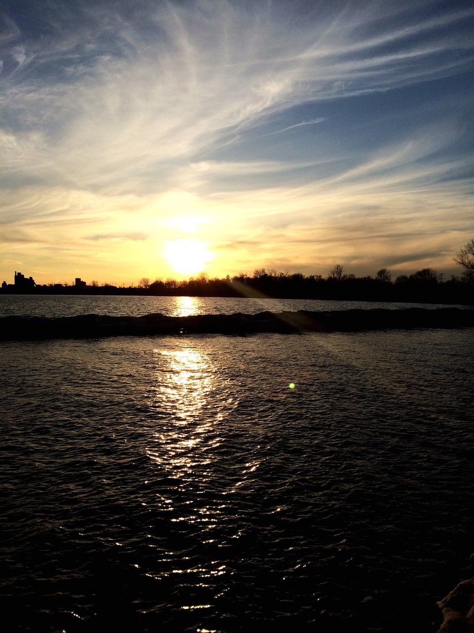 water, sunset, tranquil scene, scenics, tranquility, sky, beauty in nature, reflection, sun, waterfront, rippled, nature, silhouette, idyllic, sunlight, lake, cloud - sky, sea, cloud, outdoors