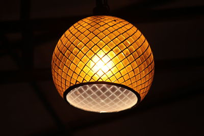 Low angle view of illuminated light bulb