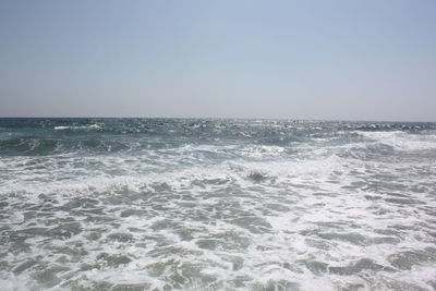 Scenic view of sea against clear sky