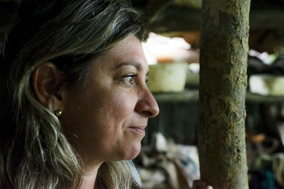 Close-up of young woman looking away