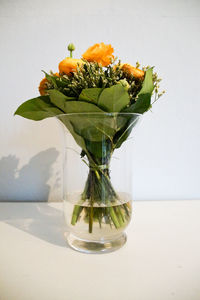 Close-up of flower vase on table