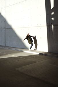 Man standing in sunlight