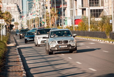 Cars on road in city