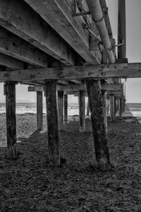 View of wooden pier on sea shore