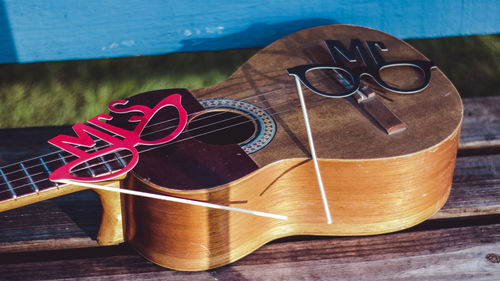 Close-up of guitar on table