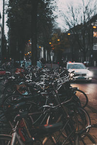 Bicycles parked on street in city