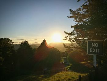 No exit sign on field during sunset