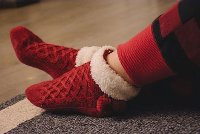 Low section of person wearing red socks during christmas