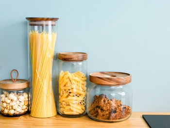 Close-up of cookies in glass on table