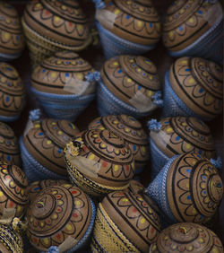 Full frame shot of spinning tops for sale